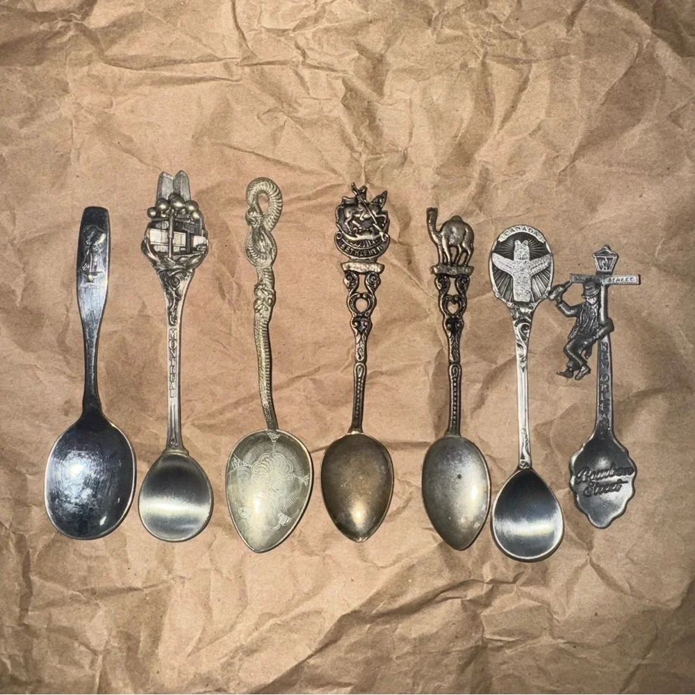 Seven Vintage Silver and Pewter Collectible Spoons